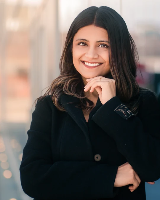 Smiling close portrait in a black blazer